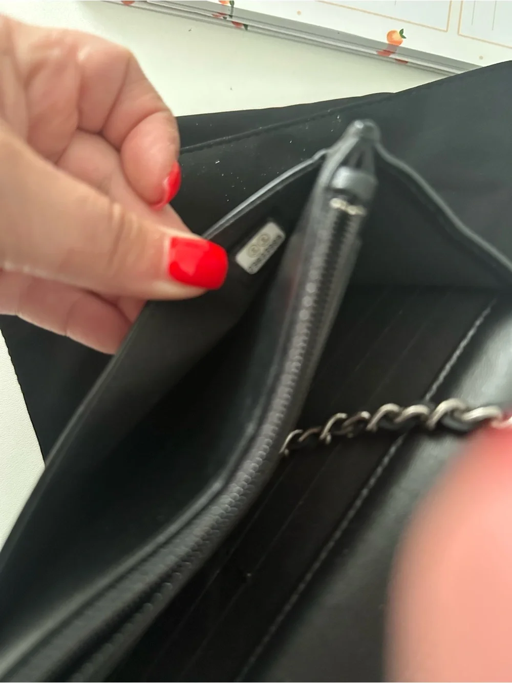 CHANEL Black Leather Clutch with Mixed Metal Chain Script
